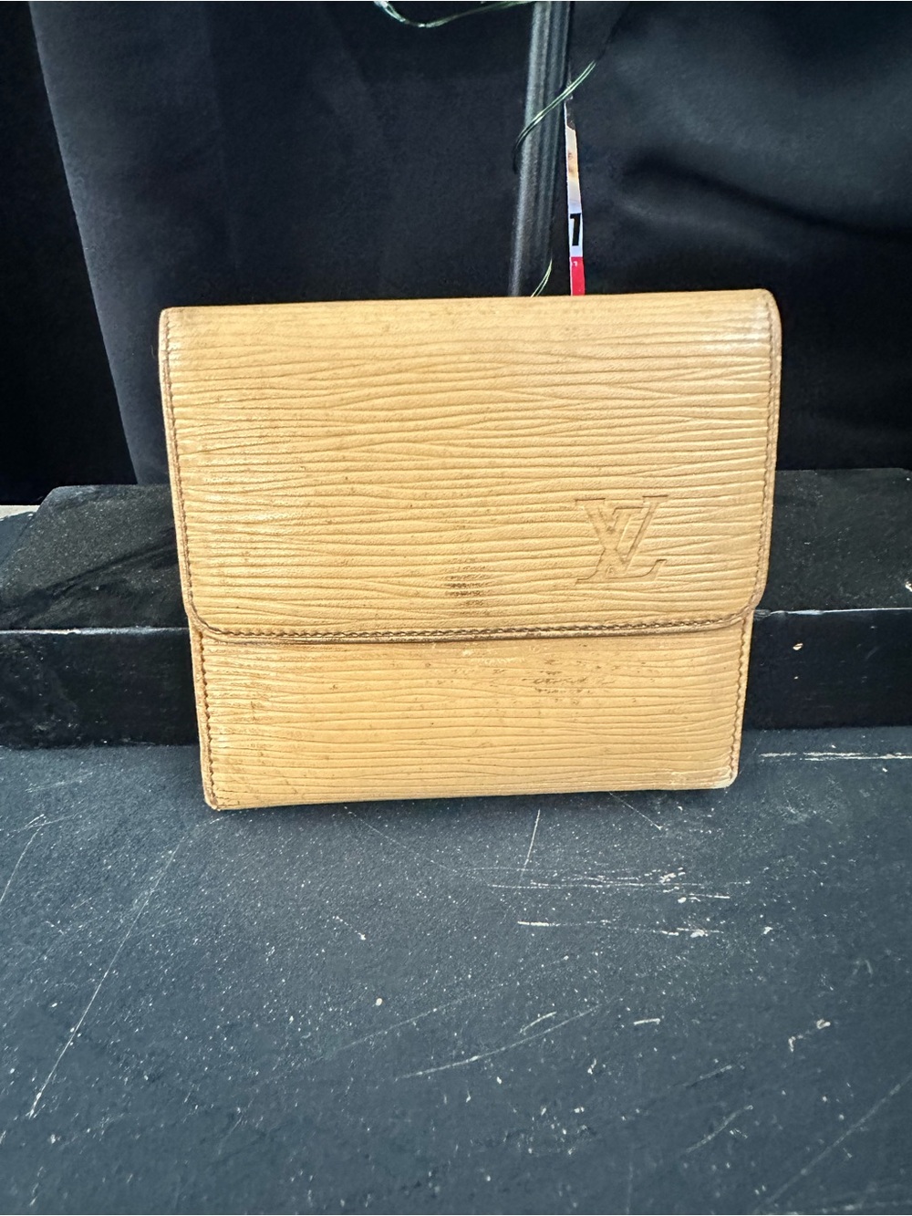 Louis Vuitton Embossed Logo Leather Wallet in Beige-Tan